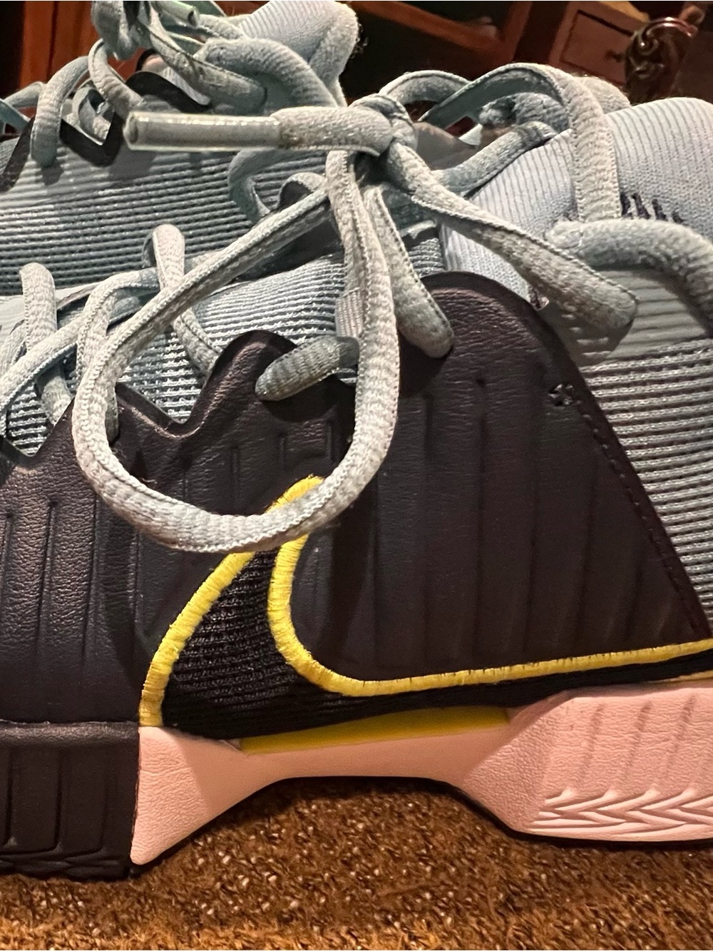 Nike Light Blue and Black Trainers with Yellow Trim